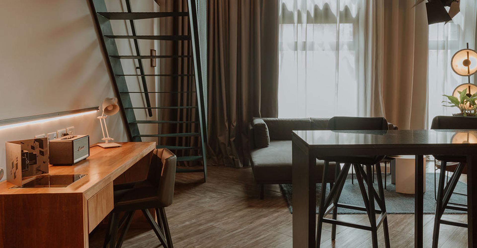 A comfortable two-person hotel suite arranged for a recovery trip together